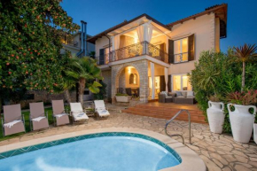 Villa Magnolia in Umag for 10 persons - first row to sea & beach - with jacuzzi and fitness area